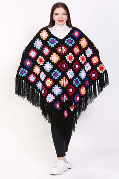 A crochet shawl for women that embodies boho charm and style, this lightweight sweater is a versatile and fashionable piece for any wardrobe. Handcrafted with intricate crochet work, it features a loose and flowy fit that drapes elegantly over the shoulders, creating a relaxed and effortless look. Perfect for layering over a simple top or dress, this boho poncho adds a touch of bohemian flair to any outfit. Whether styled with jeans for a casual day out or paired with a maxi skirt for a bohemian Navy Blue Pajamas, Shawl For Women, Boho Poncho, Intricate Crochet, Womens Pajama Shorts, Crochet Work, Simple Top, Versatile Wardrobe, Crochet Poncho