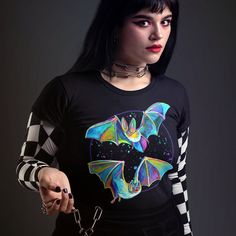 Welcome to the dark side! Looking for a fun flying bat t shirt to add some gothic flair to your wardrobe? Excellent! This gothic bats t-shirt is everything you've dreamed of and more. This just might be the softest and most comfortable women's t-shirt you'll ever own. Combine the relaxed fit and smooth fabric of this tee with jeans to create an effortless every-day outfit, or dress it up with a jacket and dress pants for a business casual look. Featuring original bat art by yours truly in my sig Bat T Shirt, Welcome To The Dark Side, Gothic Tees, Flying Bat, Bat Shirt, Bat Art, Gothic Shirts, Goth Clothing, Goth Outfits