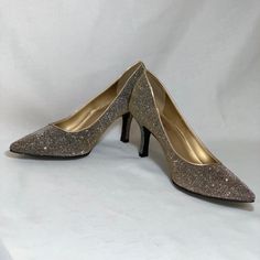 Nwot Fioni Night Heel Shoes Women's 9.5 Gold Sparkle Pump Mira Glitter Formal Party Gold Black Colored Sparkly Embellished Pump-Heel Style Shoes. Slip On With A Pointed Toe. Nwot - Tried On At Store Bundle With Other Items For Additional Discounts Including Shipping :) I Offer Same Day Shipping Whenever Possible! Everyday, Basic, Classic, Comfortable, Cozy, Casual, Workwear, Career Wear, Business Attire, Dress Party, Event Business Attire Dress, Casual Workwear, Career Wear, Gold Sparkle, Formal Party, Business Attire, Dress Party, Party Event, Heel Shoes