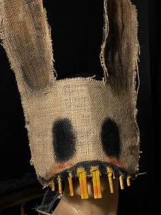 This creepy rabbit mask is made on a thick, flexible, felt base. The base is covered with hand painted fabric grade burlap and adorned with hand cut wooden teeth.  * Unique - Handmade in a smoke free studio * Lightweight - Eco-felt and burlap * Adjustable - Sturdy cotton twill tape ties in the back * Comfortable - Lined with soft eco-felt * Free First Class Shipping in the U.S. Your order will ship within three days. Water resistant, but not water-proof. You see out through the burlap in much th Bunny Mask Halloween, Creepy Rabbit, Halloween Rabbit, Rabbit Cosplay, Evil Bunny, Weird Photos, Mask Scary, Rabbit Mask, Halloween Dolls