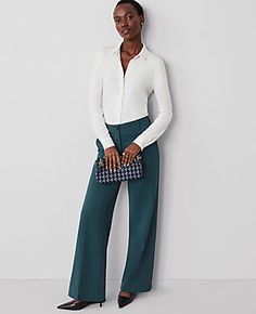 A modern must-have with a statement leg and flattering high waist. Front zip with button closure. Belt loops. Front off-seam pockets. Back besom pockets.,Leg Shape:Wide-Leg – a modern must-have with a statement leg and flattering high waist,Rise:High rise: sits 1/2" to 1" below natural waist,Imported:Imported,Fit:Relaxed & easy,Length:Full length: 31" inseam with 24" leg opening,Fabrication:62% Polyester, 34% Viscose, 4% Spandex,Garment Care:Machine Washable The Perfect Wide Leg Pant by Ann Tayl Chic Career Straight Pants, Chic Straight Career Pants, Chic Career Pants For Fall, Chic Straight Leg Career Bottoms, Chic Fall Career Bottoms, Tailored Chic Career Pants, Chic Tailored Pants For Career, Tailored Wide Leg Pants With Button Closure For Workwear, Tailored Pants With Button Cuffs For Work