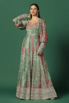 Green shaded anarkali crafted in chiffon with printed mughal motifs and gota, zari work embroidery detailing.
Components: 1
Pattern: Embroidery
Type Of Work: Gota and Zari work
Neckline: Wide V
Sleeve Type: Soft Puffed
Fabric: Chiffon, Lining: Shantoon
Color: Green
Other Details: 
Embroidered cuffs and border
Floral embroidery
Occasion: Mehendi and Haldi,Puja - Aza Fashions Chiffon Anarkali, Mehendi Dress, Chiffon Embroidery, Trendy Outfits Indian, Mehendi Outfits, Happy Dresses, Indian Outfits Lehenga, Lehenga Designs Simple, Silver Embroidery