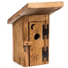 a wooden birdhouse with an open door