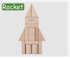 a wooden toy with a rocket on it's side and the word rocket written in green