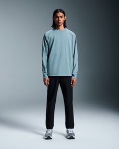 This stylish and comfortable crew is made for low-intensity activities and daily wear. With its roomy silhouette and minimalist design, the Movement Crew is an easy-to-wear essential that blends with any look. With side pockets for comfort. Breathable mesh slits on the sleeves add to the crew neck's sporty aesthetic. This standout design feature pairs perfectly with the Movement Joggers. Ribbing on the neckline, wrist cuffs and back hem give the crew neck a premium feel. A kissing edge runs alon Sporty Relaxed Fit Activewear With Straight Hem, Athleisure Tops With Pockets For Everyday, Relaxed Fit Athleisure Activewear With Straight Hem, Relaxed Fit Athleisure Activewear, Relaxed Fit Long Sleeve Activewear With Pockets, Relaxed Fit Workout Tops With Pockets, Sporty Aesthetic, Low Intensity Workout, Running Accessories