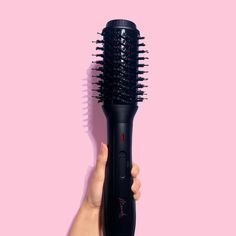 A salon quality blowout at home has never been easier! Introducing the Mermade Ionic Blow Dry Brush that dries and styles your hair in one. Basically, it combines your hair dryer and your round brush so you legit only need one tool to dry your mane. Featuring a unique oval brush, ionic technology for shine + protection plus flexible tangle-free bristles, it’s perfect for all hair types and lengths. Its super light design means you'll never have to choose between a sore arm and a killer blowout a Hair Blow Dryer, Oval Brush, Blow Dry Brush, Hair Waver, Fall Wardrobe Essentials, Heat Protectant, Dry Brush, Round Brush, Plastic Design