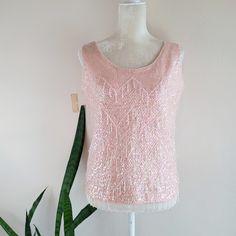 Chic + Sophisticated. Vintage 60s Pink Sequin And Beaded Sleeveless Sweater Top. Hand Beaded Zig Zag Pattern With Dangling Tassel Accents On An Iridescent Sequin Background. Gentle Scoop Neckline. Intricate Detail + Expert Craftsmanship. Full Metal Zipper Up The Back. Fully Lined (Possibly Silk). Pair With Jeans, Trousers, Or Leather Pants. Nwt Deadstock. Couture Quality. Bought At Gimbels Schusters (Milwaukee, Wisconsin) In The 1960s. Original Tag Still Attached! Flapper Gogo Mod Glam Femme Pink Sequin Tank Top For Spring, Glamorous Pink Tank Top For Spring, Pink Sleeveless Sequined Tops, Pink Sequined Sleeveless Tops, Elegant Pink Tank Top For Night Out, Vintage Pink Tank Top For Summer, Elegant Pink Tank Top For Evening, Elegant Pink Evening Tank Top, Vintage Embellished Sleeveless Top