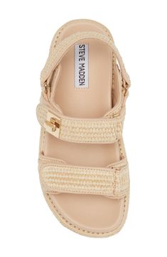 Woven raffia lends a boho-inspired aesthetic to a warm weather–ready sandal lifted by a chunky platform and serrated sole. 2 1/4" heel; 1 1/2" platform (size 8.5) Adjustable slingback strap with hook-and-loop closure Synthetic upper, lining and sole Imported Raffia Sandals Outfit, Beachy Shoes, Straw Sandals, Raffia Sandals, Pretty Sandals, Inspired Aesthetic, Steve Madden Sandals, Chic Sandals, Sandals Outfit