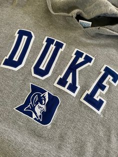 Vintage Duke University Hoodie Sweatshirt  Size 3XL See pics for measurements  Quality Embroidered Logo  Blue Devils  Fine condition  Quick shipping. We ship same or next day with USPS MAIL  We are a small family business and we appreciate your purchase, Godspeed ! College Sweatshirt Aesthetic, Sporty College Hoodie With Letter Embroidery, College Fan Apparel Hoodie With Embroidered Logo, Varsity Hoodie With Letter Embroidery For College, Varsity Long Sleeve Hoodie With Embroidered Graphics, College Fleece Hoodie With Embroidered Graphics, College Hoodie With Letter Embroidery, College Hoodie With Letter Embroidery And Long Sleeves, College Embroidered Graphics Hoodie