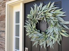 The Nautical Wreath with Eucalyptus and Bay Leaf brings timeless elegance to your spring decor with its muted silver-green leaves of bay and eucalyptus. Evoking the fresh, crisp air of a seaside garden, this wreath offers an understated yet sophisticated look. With its versatile design, this wreath complements a variety of styles, from coastal cottage to modern chic. Perfect for both indoor and covered outdoor use, it adds a light, refreshing touch to any space. Simple Door, Fruit Wreath, Wreath Hangers, Seaside Garden, Nautical Wreath, Wreath Accessories, Swag Wreath, Tulip Wreath, Artificial Foliage