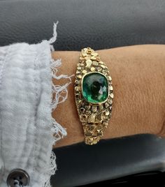 "ATTENTION BUYERS.. PLEASE READ ANNOUNCEMENT IN MY SHOP. it's very important information there about purchasing items. Must purchase thru Etsy only, NOT from \" Offsite ads\"Absolutely Stunning 14k Yellow Gold, Huge Green Natural Tourmaline Nagged Bracelet.. Tourmaline is natural, not Treated, have inclusions.. Custom Made, One Of A Kind Bracelet is in Bery good Vintage Pre Owned Condition. Weight is 25.5 Grams approximately all sales are final Some pics ENLARGED to see details. Bracelet look Spectacular, Yellow gold great combination with Green Tourmaline....ATTENTION BUYERS ALL ITEMS FROM MY SHOP MUST BE PURCHASED STRAIGHT FROM ETSY, NOT FROM OFFSITE ADDS  All orders purchasing from Google and others will be cancelled" Elegant Gold Tourmaline Bracelets, Gold Tourmaline Gemstone Bracelets, Gold Tourmaline Bracelet Jewelry, Gold Tourmaline Bracelet, Elegant One-of-a-kind Gold Bracelet, Formal Gold Jewelry With Tourmaline, Formal Gold Tourmaline Jewelry, Luxury Gold Tourmaline Jewelry, Green Tourmaline