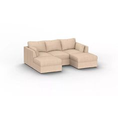 a beige sectional couch sitting on top of a white floor next to a footstool