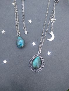 PLEASE read my shop announcement before placing an order so you know what to expect right now. Plus, when ordering from outside Europe, don't forget to provide a phone number for the courier to ensure the fastest and smoothest delivery. Simple celestial labradorite necklace in antique silver color / stainless steel chain, AAA quality gemstone, with a stunning flashy dark blue shine, perfect pendant necklace for any magical boho outfit to layer with other necklaces and chokers. I wanted a very sh Silver Teardrop Necklaces With Moon Charm, Silver Teardrop Necklace With Moon Charm, Mystical Silver Teardrop Necklace, Celestial Silver Labradorite Jewelry, Handmade Celestial Labradorite Necklaces, Celestial Labradorite Necklace For Gift, Celestial Silver Labradorite Necklace, Silver Labradorite Teardrop Necklace, Silver Labradorite Pendant Crystal Necklace