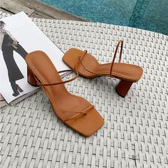 The search for perfect mules stops here! A modern style, Andrea Sandals are made from smooth vegan leather, comfortable and stylish these sandals will give a look unlike any already in your closet. Vegan Leather upper 6cm heel Slip-on Square open toe Imported Trendy Brown Sandals With Sculpted Heel, Trendy Open Toe Mules With Sculpted Heel, Trendy Open Toe Mules With Wooden Heel, Trendy Open Toe Mules With Wrapped Heel, Trendy Mules With Wooden Heel For Summer, Trendy Summer Mules With Wooden Heel, Trendy Open Toe Mules With Heel Loop, Chic Toe Post Mules With Padded Heel, Sandals 2020 Trends