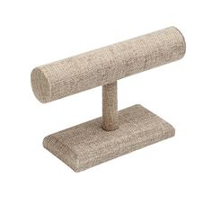 a cat scratching post made out of jute and fabric, with a roll on top