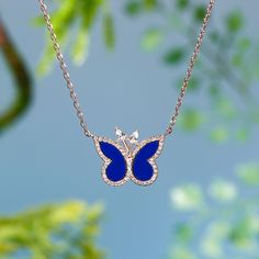 The most beautiful and delicate butterfly necklace is made with blue lapis lazuli and set in 925 sterling silver. The butterfly wings are surrounded with pave crystal for an added sparkle. Both delicate and pretty, the butterfly is a symbol of transformation and hope. Blue lapis lazuli is a universal symbol of wisdom and truth.Carat Weight: 0.601 ctStone Size: 2*3,1.5,1.2,0.9 mmStone Type: Jeulia® StoneNumber of Stones: 55 Stone Shape: Pear, RoundStone Color: Diamond WhiteWeight: 3.78 gMaterial: Sterling Silver Butterfly Gemstone Necklace, Elegant Blue Butterfly Jewelry, Blue Butterfly Fine Jewelry, Dainty Blue Butterfly Jewelry, Blue Butterfly Sterling Silver Jewelry, Elegant Gemstone Butterfly Necklace, Elegant Blue Necklace With Butterfly Charm, Elegant Blue Sterling Silver Butterfly Necklace, Elegant Blue Butterfly Necklace With Charm