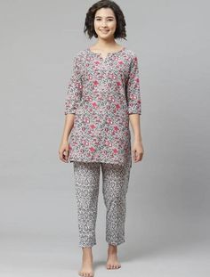 Grey and pink night suit consists of kurti and pyjamas Grey and pink floral printed kurti, has a round neck, three-quarter sleeves A pair of grey and pink printed pyjamas, has an elasticated waistband with slip-on closure Material & Care Top fabric: Pure Cotton Bottom fabric: Pure Cotton Hand-wash Specifications Bottom Closure- Slip-On Bottom Fabric -Pure Cotton Bottom Pattern -Printed Bottom Type -Pyjamas Neck- Round Neck Print or Pattern Type Ethnic Motifs Sleeve Length -Three-Quarter Sleeves Sustainable -Regular Top Fabric - Pure Cotton Top Pattern- Printed Top Type- Kurti Wash Care- Hand Wash Complete The Look Pink Floral Print Home Set, Pink Home Sets With Floral Print, Pink Daywear Set With Long Pants, Pink Floral Print Loungewear Sets, Pink Floral Print Straight Kurta Sets, Pink Floral Print Sets For Daywear, Pink Matching Sets For Daywear, Pink Long Pants Sets For Pajama Party, Casual Festive Loungewear Set