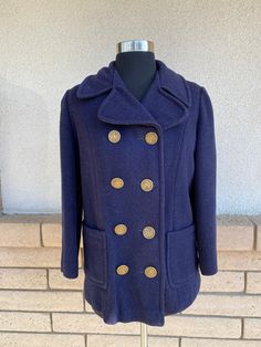 "Vintage 1960's era peacoat. Dark navy blue with a subtle fleck. Double breasted style with princess seams. Gorgeous embossed gold tone buttons. Double patch pockets. Attached back belt. Faux fur mustard color lining with quilted sleeve lining. Great vintage condition! There are no labels. Fabric looks like woven wool or wool blend. Size extra small is just an estimate. For reference my dress form measures 33x23x34. Please check measurements for an accurate fit. Questions are welcome! Coat was m Navy Peacoat, Mustard Color, Princess Seams, Double Breasted Coat, My Dress, Dark Navy Blue, Color Lines, Dress Form, Princess Seam