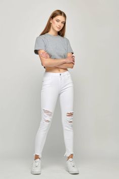 This jean is a wardrobe essential! Perfect for rocking all year round, it's the white jean you've been searching for! Enjoy its slim fit and distressed style that are sure to turn heads. Get 'em while they last! White Jeans Women, White Mom Jeans, Jeans Women, Christmas List, Wardrobe Essentials, White Jeans, The White, Mom Jeans, Slim Fit