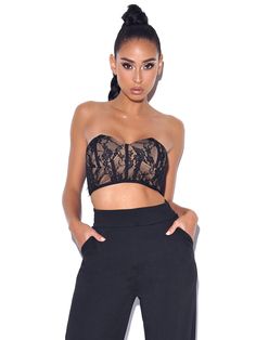 Keep  it Chic in this black laced crop top . This fully cupped lace top is perfect for adding a touch of glam to any look . The nude lining and zippered back add subtle detailing . Add our never enough crepe pants for a flattering weekend look. Materials:Lace Stretch Factor: 2/3 Clean: Dry-clean only Length:Approx 6inc Black Lace Corset Top, Stretch Lace Top, Black Lace Crop Top, Crepe Pants, Black Lace Corset, Lace Corset Top, Tie Dye Jumpsuit, Corset Crop Top, New Romantics