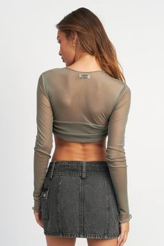 This Crew Neck Ruched Bust Crop Top is made of 95% polyester and 5% spandex for a comfortable stretch that is also durable. The fabric is lightweight and breathable, perfect for any activity. This top is both stylish and practical. SIZE & FIT : MODEL WEARS SIZE SMALLMODEL'S HEIGHT 5'9 Made In: USA Fabric Contents: 95% POLYESTER, 5% SPANDEX Curves And Confidence, Mesh Long Sleeve, Sheer Fabric, Sheer Top, Sheer Fabrics, Matching Dresses, Comfortable Fashion, Long Sleeve Crop Top, Trend Setter