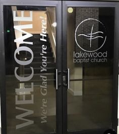 the front door to lakewood baptist church, which has been painted with white lettering