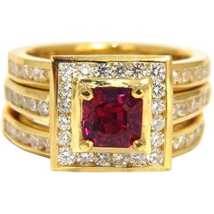 GIA Certified 1.51Ct Natural Ruby Ring Report: 5171034909 Octagonal cut (asscher cut) Excellent color stability Pigeon Blood Red. Excellent cut Clean Clarity Thailand Origin Round Diamonds: 2.00ct. G-color Vs-2 clarity. 18kt. yellow gold (3) Rings Sizes: 6.75 & can be resized, please inquire first. Deck of center ring: .45 X .48 inch depth: .30 inch Each band: .11 inch wide Natural Ruby Ring, Diamonds Ring, Asscher Cut, Wide Rings, Blood Red, Ruby Diamond, Red Ruby, Shop Engagement Rings, Ruby Ring