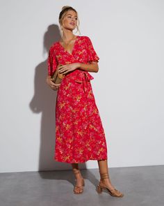 Look pretty and polished at your next celebratory event with this wrap maxi dress. It comes in a bold, beautiful hue with flowers all over and wraps at the front. We love that it has relaxed short sleeves, too! Style it with your favorite clutch and heels. Wrap dress Surplice neckline Short sleeves Floral print Self: 54% Rayon 46%Viscose, Lining: 90% Rayon 10% Spandex Pretty And Polished, Floral Wrap Maxi Dress, Spring Maxi Dress, Spring Celebration, Wrap Maxi Dress, Surplice Neckline, Floral Wraps, Maxi Wrap Dress, Spring Dresses