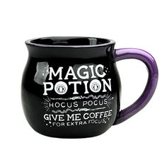 a black coffee mug with purple handle and the words magic potion on it's side