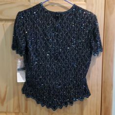 Brand New Navy Blue Sequined Top. Size Small. Purchased At Dress Barn. Extra Sequins In Bag. Blue V-neck Blouse For Evening, Elegant Blue Blouse For Party, Blue Fitted Blouse For Evening, Blue Stretch Blouse For Night Out, Blue Stretch Top For Formal Occasions, Formal Stretch Blue Top, Elegant Blue Sequined Tops, Elegant Blue Top For Night Out, Blue Sequin Top For Party Season