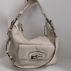 Coach New With Tag! 100% Guaranteed Authentic. 14769 Style Kristin. Chalk Leather Bag Convertible Hobo Crossbody Bag With Silver Hardware. With Hang Tag. Bag Measures Approx 11.5h X 14 X 4.75 Inches. 9 Inch Drop Leather Shoulder Strap And A Removable Long Crossbody Strap. Interior Has One Compartment With Multiple Pockets; Clean. Front Side Flap Pocket With Latch Closure. Zip Top. With Tags. From A Smoke-Free Environment. Hobo Bag With Silver-tone Hardware For Errands, Cream Tote Shoulder Bag With Palladium Hardware, Coach White Soft Leather Bag, White Soft Leather Coach Bags, Cream Shoulder Bag With Palladium Hardware For Everyday Use, Green Coach Purse, Coach Hobo Bag, Leather Hobo Handbags, Canvas Leather Bag