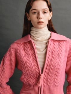 Editor's NotesThis TWO-TONE ZIP-UP CARDIGAN features a wool-cotton blend construction and cable-knit pattern to keep you warm and looking your best. The cardigan used a subtle blend of white-colored yarn.- Wide collar- Cable-knit pattern- Long sleeves- Cropped length- Zippered front* Photos of the model fit may appear different in color due to the weather and lighting at the time of shooting  so please check the detail cut for the exact color.Measurements(in.)Size: S / M- Total length: 19.2 / 20.4 in.- Shoulders: 13.9 / 14.5 in.- Chest: 18.1 / 19.6 in.- Hem: 14.9 / 16.9 in.- Sleeve length: 23.6 / 24 in.- Sleeve width: 3.7 / 3.7 in.*Chest  waist  hem  and sleeve sizes are based on cross-section.*There may be an error of about 0.39 to 0.78 in. in size depending on the measurement method.*The Pink Winter Cable Knit Cardigan, Winter Pink Cable Knit Cardigan, Pink Cable Knit Winter Cardigan, Cozy Pink Cable Knit Outerwear, Pink Long Sleeve Cable Knit Outerwear, Cardigan Pink, Pink Cardigan, Model Fits, Knitwear Cardigan