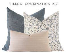 three pillows with different colors and patterns on them, one is blue and the other has white