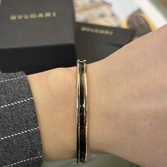 This Stunning B.Zero1 Open Cuff Bracelet Comes From The House Of Bvlgari. Well Crafted In 18k Rose Gold And Ceramic. This Bracelet Features Black Ceramic In The Center With Rose Gold Frame. Bvlgari Logo Engraving On The Edges. Size: Medium. Wrist Measurement: 7 Inches. Width: 6 Mm. Total Weight: 20.32 Grams. Made In Italy. Condition: New Without Tags. Comes With An Original Box And Paper. Id: 02297 Formal Rose Gold Round Cuff Bracelet, Elegant Rose Gold Cuff Bracelet For Formal Occasions, Luxury Rose Gold Bangle Cuff Bracelet, Luxury 14k Gold Cuff Bracelet With Polished Finish, Luxury Yellow Gold Cuff Bracelet With Shiny Finish, Luxury 14k Rose Gold Cuff Bracelet, Luxury Rose Gold Bracelets With Polished Finish, Luxury Rose Gold Cuff Bracelet For Formal Occasions, Luxury Rose Gold Cuff Bracelet For Formal Events