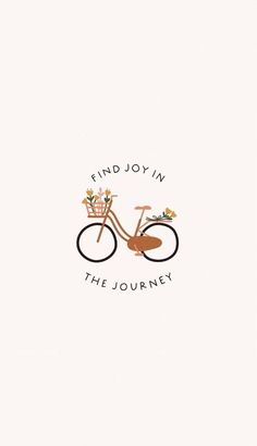 a bicycle with flowers on the front and back, that says find joy in the journey