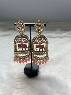 Earring Length: 10 CM XWidth: 3.5 CM Metal: Alloy With Good Quality Gold Plated Color: Pink Stone: Kundan   Package Content: 1 Pair Of Earrings Back Finding: Post With Friction Back x Earring Style: Dangle Care Instruction : Avoid Heat & Chemicals Like Perfume, Deo, Alcohol, Etc. | Clean With Dry Cotton Cloth | Pack In An Air Tight Container After Use. Desi, desi bride, Sikh bride, bridesmaids, gift, traditional, versatile, simple, polki, kundan, rose gold, gold plated, Punjabi bride, Pakistani Dulhan Bridal, Desi Traditional, Chandbalis Earrings, Pastel Trends, Sikh Bride, Statement Earrings Wedding, Desi Bride, Chandbali Earrings