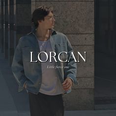 a man standing in front of a building with the words lorgan written on it