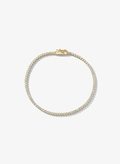 This 14k gold delicate tennis bracelet features 1.50ctw lab grown round diamonds. It's dainty size makes it the perfect tennis bracelet for daily wear on its own or stacked with other diamond and/or solid gold bracelets. Luxury Lab Grown Diamond Engagement Bracelet, Classic White Gold Tennis Necklace For Everyday, Dainty 14k Yellow Gold Tennis Bracelet, Classic 14k Gold Diamond Bracelet With Vvs Clarity, Classic Everyday Gold Bracelet With Cubic Zirconia, Gold Tennis Bracelet With Prong Setting For Everyday Wear, Dainty Yellow Gold Diamond Bracelet With Prong Setting, Everyday Luxury Tennis Bracelet With Prong Setting, Dainty 14k Gold Tennis Bracelet With Diamond Cut