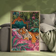 a tiger laying on top of a bed next to pillows and blankets in a room with green walls