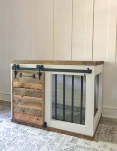 a dog house made out of wood and metal bars