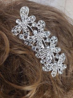 Crystal Bridal Hair Comb Silver, Wedding Dragonflys Bridal Side / Back Hair Clip, Rhinestone Floral Wedding Hair Accessories The ultimate silver hair accessory for the bride, a vintage style addition to any bride's collection of hair adornments! This exquisite wedding hair comb showcases clear crystals and dazzling rhinestones. It effortlessly complements both long and elaborate updos as well as bridal short hairstyles. The robust headpiece boasts a lustrous silver finish and is ingeniously desi Silver Hair Jewelry, Prom Hair Pieces Silver, Silver Wedding Hair Clip, Elegant Silver Headpiece With Rhinestones, Silver Crystal Hair Accessories For Wedding, Silver Hair Accessory, Crystal Hair Comb Wedding, Hair Adornments, Hair Comb Wedding