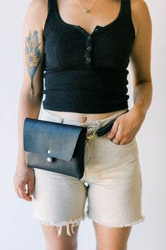 An incredibly versatile, best-selling day bag from Austin based Weather & Story. Strap can be removed and adjusted to wear at the hip, as a cross body, or carry as a clutch. Features interior pocket and magnetic closure for added security. Handmade in Austin, Texas using 100% vegetable tanned Italian leather that will patina with age and use. 100% Vegetable Tanned Leather Handemade in USA Measures 9.25" x 6" Hip Satchel, Day Bag, Austin Texas, Vegetable Tanned Leather, Black Design, Magnetic Closure, Belts For Women, Italian Leather, Tan Leather