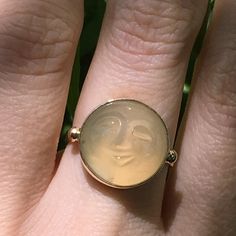 Luminescent, Hand-carved Moonstone ring shows a shining, happy (Buddha?) face. The lovely soft color of this gemstone plays with the light and is enhanced by SASA's trademarked handmade setting in 14K solid yellow gold. This ring can be re-sized. Ring sizing takes 10 days and a new setting 3 weeks. Both processes are free to our customers. According to Hindu mythology, moonstone is made of solidified moonbeams. Many other cultures also associate this gem with moonlight, and it's easy to see why. Luxury Handmade Gold Moonstone Ring, Luxury Yellow Gold Spiritual Moonstone Ring, Luxury Gold Moonstone Ring With Large Stone, Yellow Gold Moonstone Ring, Buddha Face, Birthday Wishes For Myself, Happy Buddha, Hindu Mythology, Herkimer Diamond