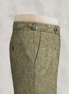 Achieve that gentlemen dapper look by donning our Harris Barley Brown Highland Tweed Trousers. Crafted from pure wool, the trousers hue offer a vintage look and feel to your ensemble and is sure to make a sharply cut addition to your tailoring collection. 
 
 Look Includes   Harris Barley Brown Tweed Fabric  Cross Pocket  Forward 2 Pleats  Side Tabs (No Loops)- Arrow Shape  Bottom Cuff (1.5")  Two Welted Back Pockets on Trousers   
 You can change the look during customization if required. 
 
 L Fitted Double-breasted Brown Tweed Jacket, Vintage Tailored Brown Tweed Jacket, Brown Single-breasted Tweed Suit, Tailored Brown Single-breasted Tweed Jacket, Luxury Brown Menswear-inspired Tweed Jacket, Fabric Cross, Tweed Trousers, Brown Tweed, Tweed Fabric