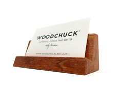 woodchuck business card holder holds up a piece of paper that is on top of it