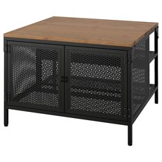 a black metal and wood cabinet with mesh doors