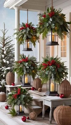 christmas decorations are hanging from the ceiling in front of a porch with pine cones and greenery