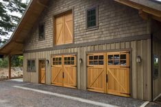 an image of a garage with three doors