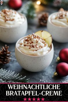 three small bowls filled with whipped cream and topped with cinnamon sprinkles next to christmas decorations