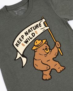 Hold it high & wave it proud! This tee is designed for your little bear to celebrate their love for nature. It's unbelievably comfy + soft, and holds up to the wear & tear of little explorers! Regular fit Lightweight Cotton/poly blend We’re not your average outdoor brand... together we pick up one pound of trash from the wild for every product sold! Find out more here! Bear Shirt Kids, Recycle Water Bottles, Made For Kids, Pet Gear, Best Water Bottle, One Pound, Little Bear, Happy Camper, Love Stickers